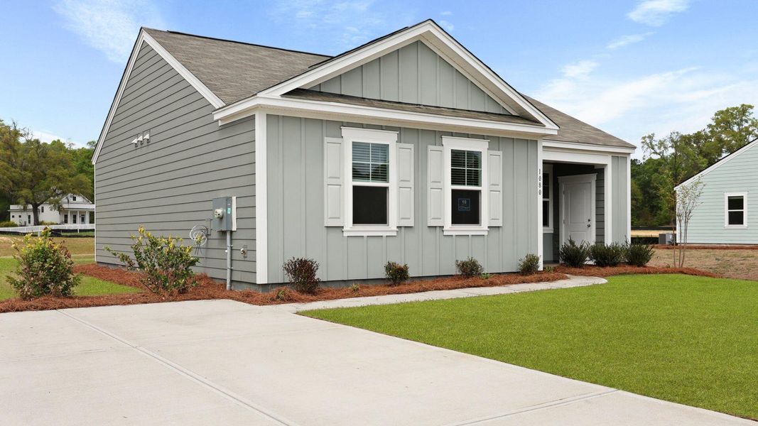 Front exterior of a new home in North Shore, Summerton, SC, highlighting curb appeal (Image 2).