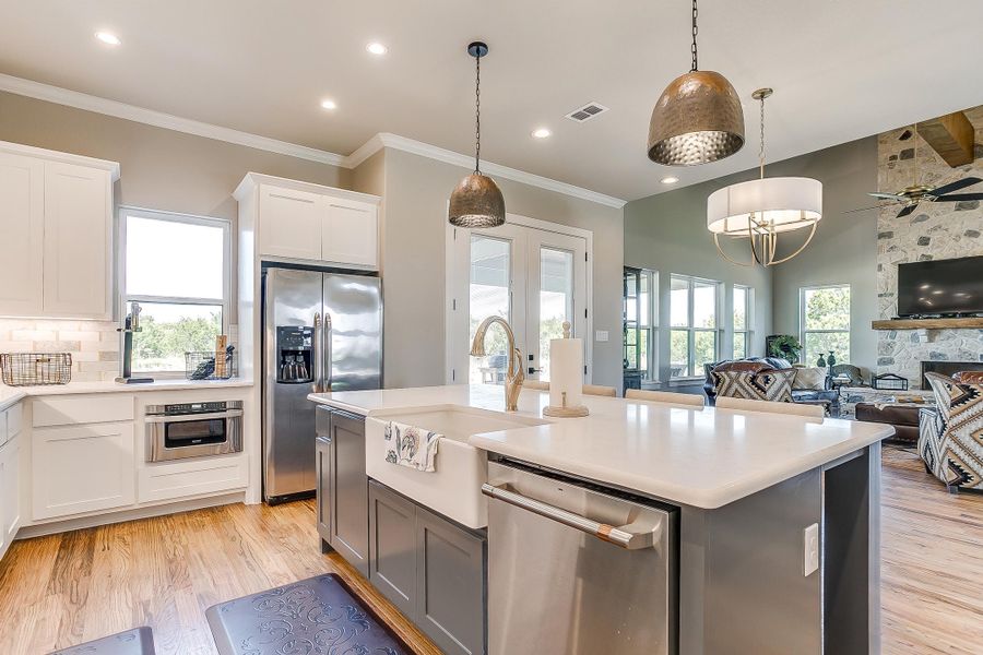 Representative furnished interior of a home built from the Rolling Wood by Trinity Classic Homes in Freeman Ranch, Weatherford (Image 9).
