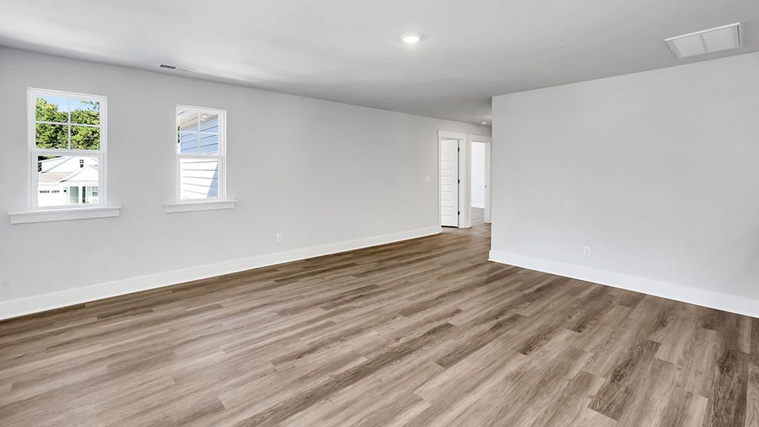 Spacious, unfurnished interior of a new home in The Haven at Indigo Preserve, Leland (Image 21).