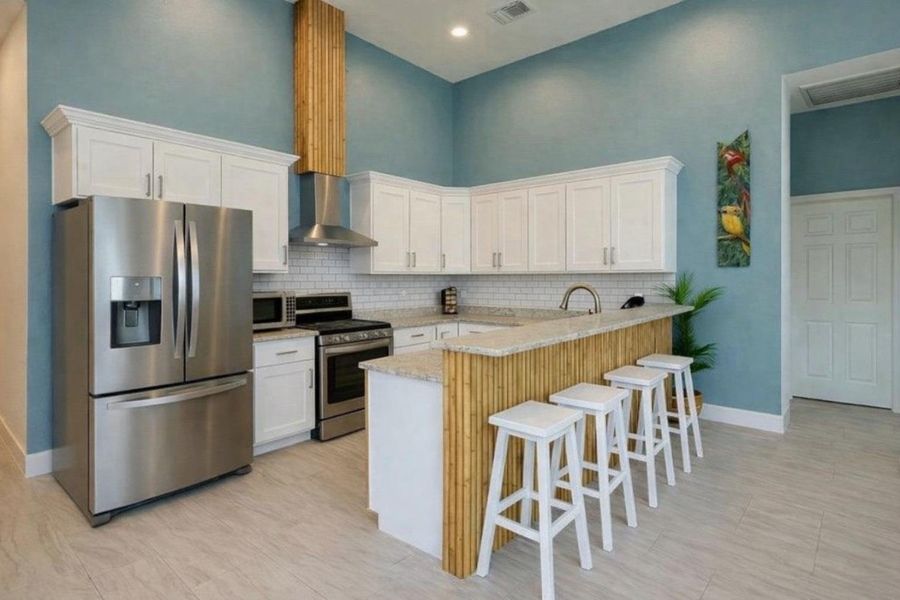 Furnished interior view inside a new home in , San Leon (Image 7).