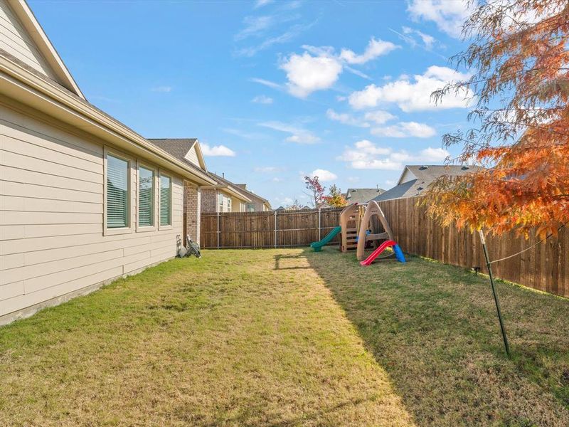 View of yard featuring a playground