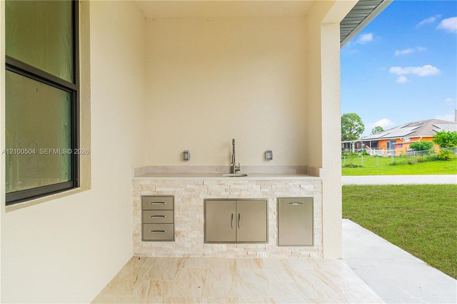 Exterior details and patio area of a home in , Lehigh Acres (Image 28). Exterior details and patio area of a home in , Lehigh Acres (Image 28).
