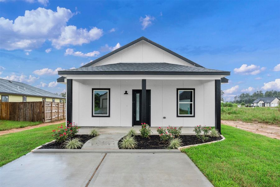 Front exterior of a new home in , Cleveland, TX, highlighting curb appeal (Image 1). Front exterior of a new home in , Cleveland, TX, highlighting curb appeal (Image 1).