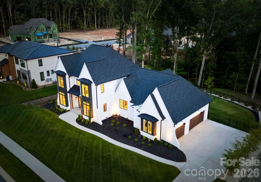 Front exterior of a new home in , Weddington, NC, highlighting curb appeal (Image 7). Front exterior of a new home in , Weddington, NC, highlighting curb appeal (Image 7).