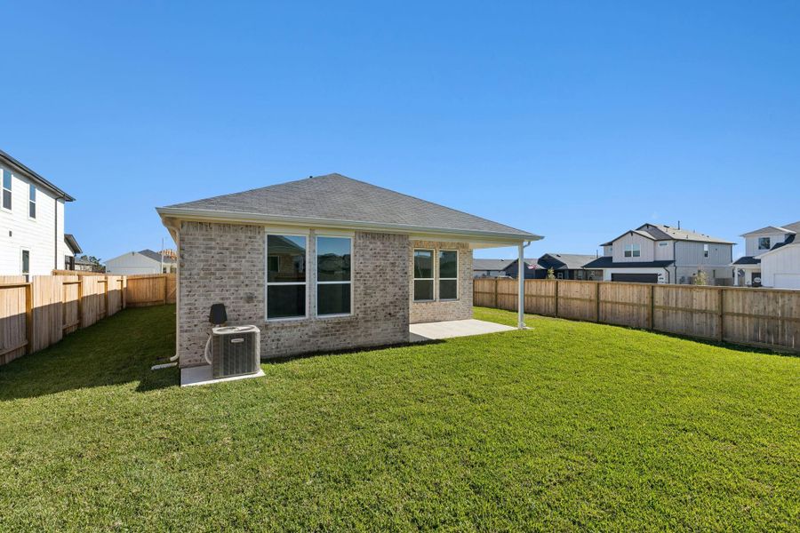 Exterior details and patio area of a home in Montgomery Bend, Montgomery (Image 20).