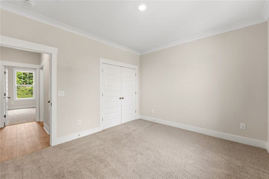Step into this naturally illuminated bedroom featu