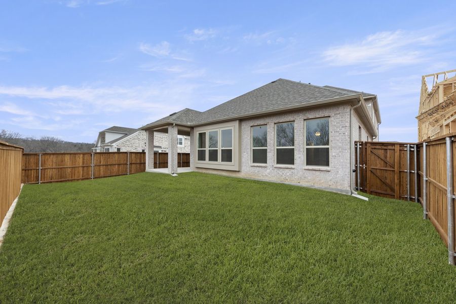 Exterior details and patio area of a home in Providence Cove, McKinney (Image 20). Exterior details and patio area of a home in Providence Cove, McKinney (Image 20).