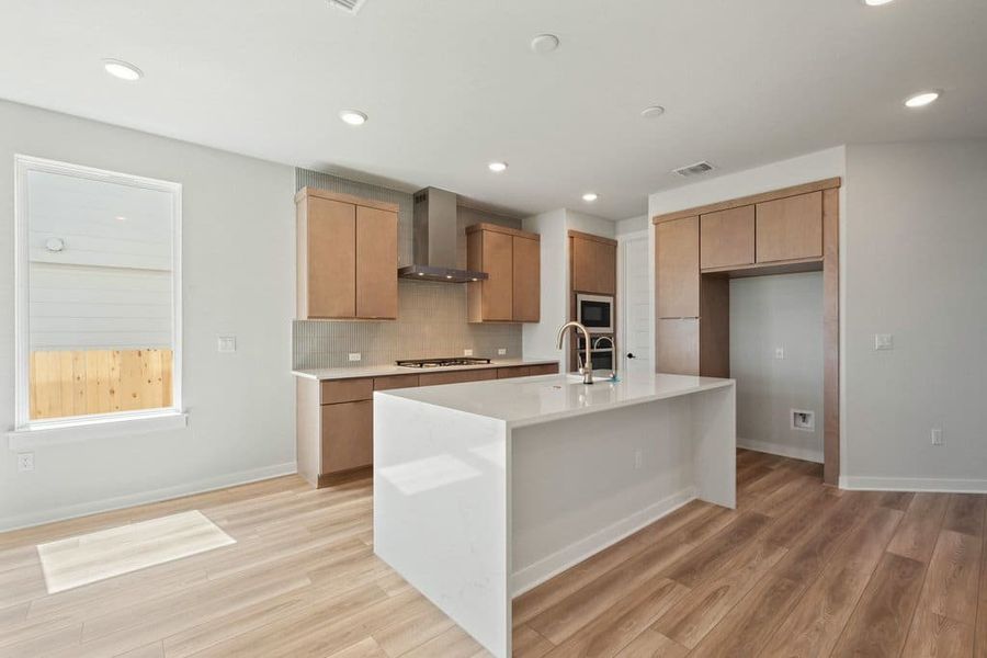 Furnished interior view inside a new home in Terrace Collection At Turner's Crossing, Buda (Image 13).