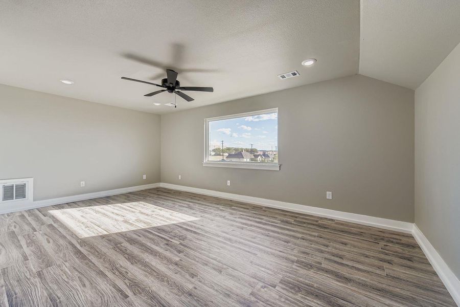 Spare room with light wood-style floors, recessed lighting, and a ceiling fan