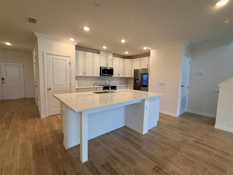 Furnished interior view inside a new home in , Mascotte (Image 28).