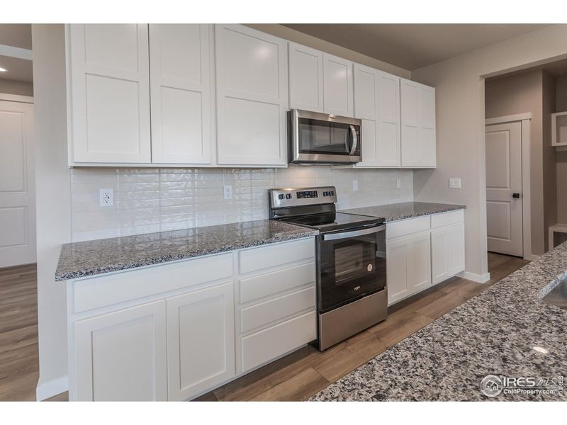 Furnished interior view inside a new home in Promontory Point, Greeley (Image 16).