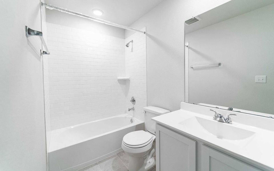 Furnished interior view inside a new home in Massey Oaks, Pearland (Image 13). Furnished interior view inside a new home in Massey Oaks, Pearland (Image 13).