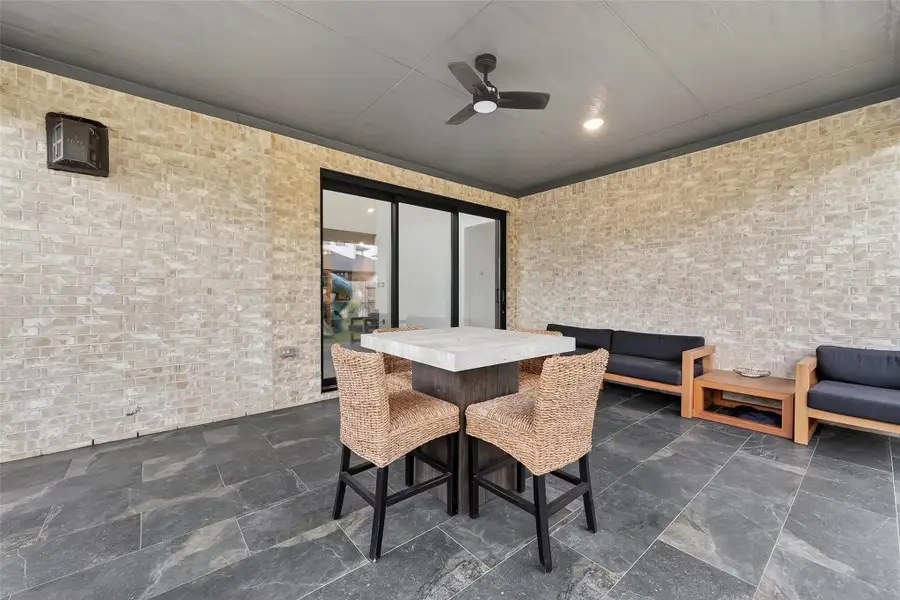 Exterior details and patio area of a home in Avalon at Cypress, Cypress (Image 4).