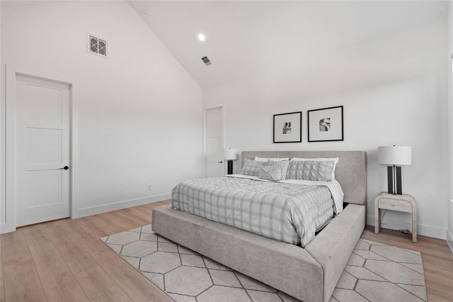 The primary suite is defined by generous scale and a restrained layout, offering a quiet retreat where architectural simplicity supports rest and privacy.