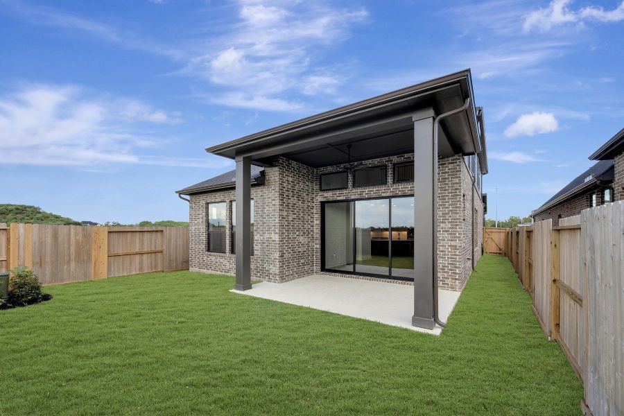 Exterior details and patio area of a home in Sienna - Grove Collection, Missouri City (Image 3). Exterior details and patio area of a home in Sienna - Grove Collection, Missouri City (Image 3).
