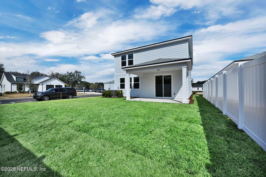 Exterior details and patio area of a home in Murray Farms, Middleburg (Image 3).