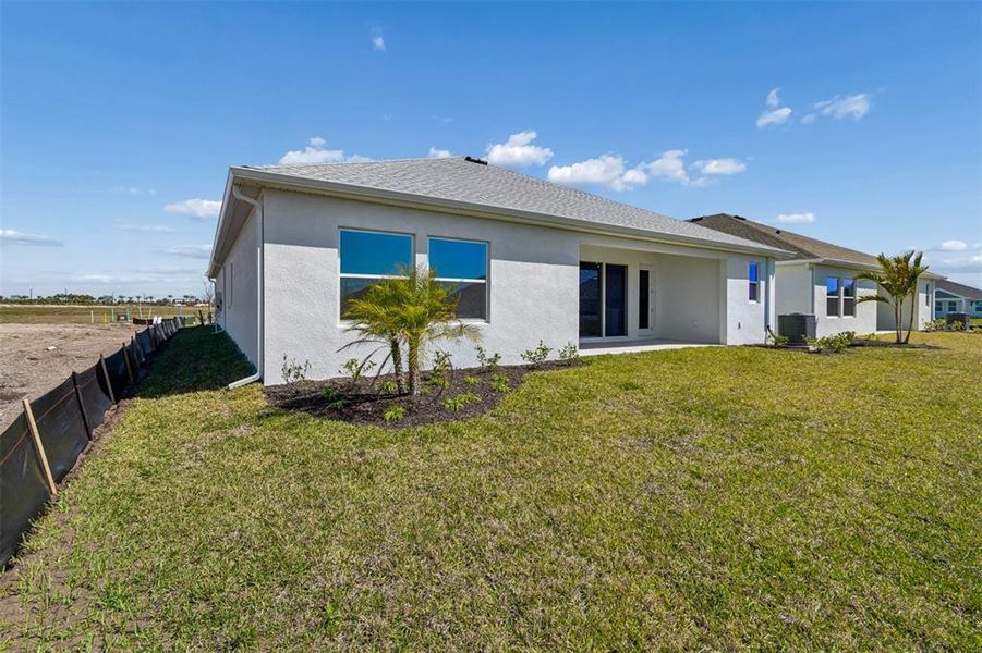 Exterior details and patio area of a home in Coasterra, Palmetto (Image 3).