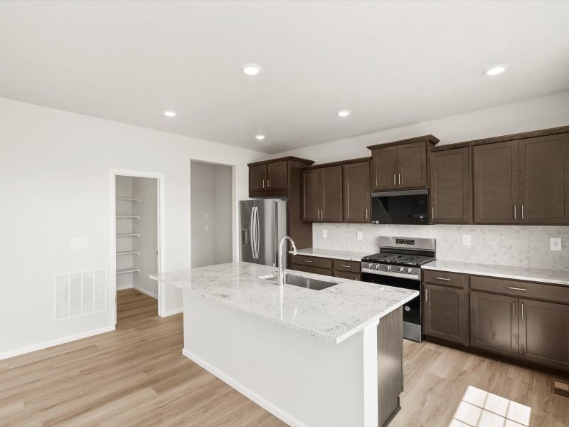 Furnished interior view inside a new home in Buffalo Highlands: The Canyon Collection, Commerce City (Image 4).