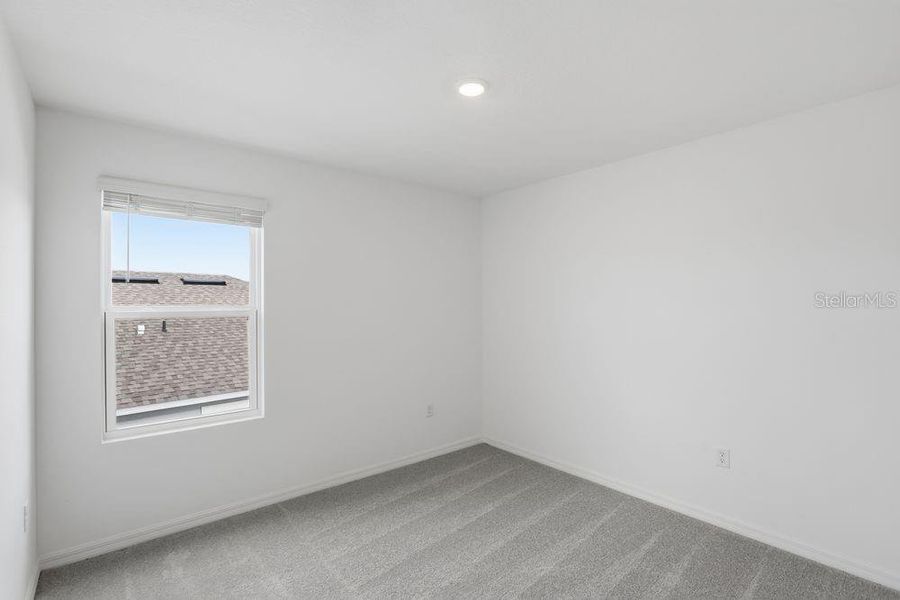 Spacious, unfurnished interior of a new home in Waterstone, Groveland (Image 38).