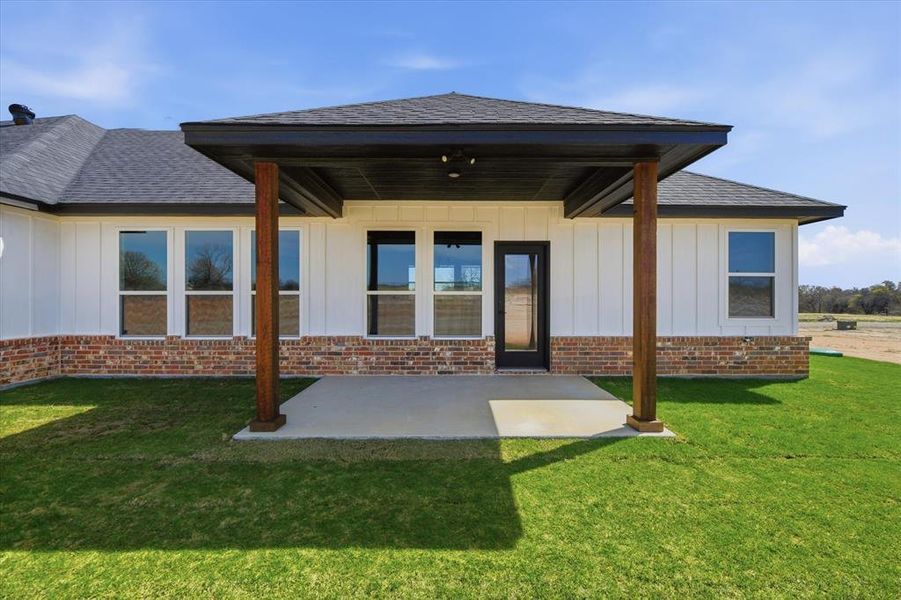 Exterior details and patio area of a home in Zion Valley, Springtown (Image 4).