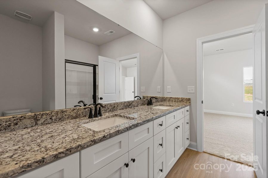 Furnished interior view inside a new home in Ascot Woods, Charlotte (Image 9).