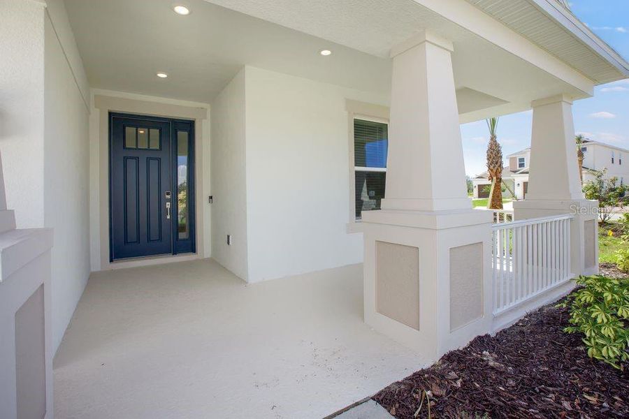 Exterior details and patio area of a home in Firethorn, Parrish (Image 3).