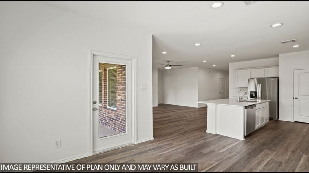 Representative furnished interior of a home built from the Midland by D.R. Horton in Sunterra, Katy (Image 9).