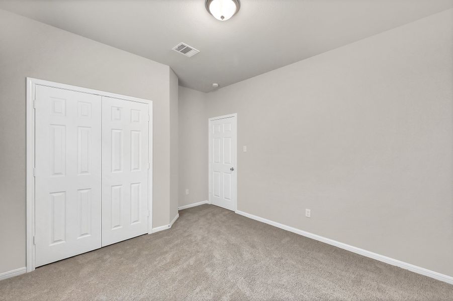 Representative unfurnished interior of a home built from the Floor Plan 1427 by Colina Homes in River Ranch, Dayton (Image 22).