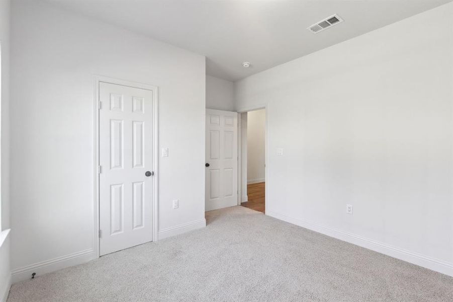 Bedroom 1 with walk-in closet