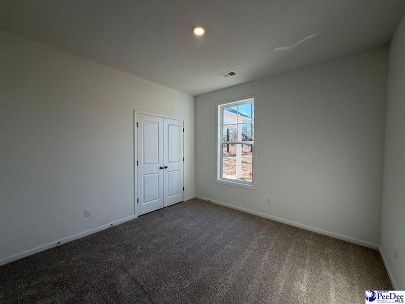 Spacious, unfurnished interior of a new home in The Grove, Florence (Image 13).