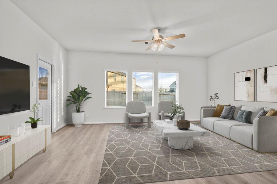 This virtually staged family room showcases the open-concept layout and abundant natural light that flows through large windows overlooking the backyard. It offers the perfect setting for both relaxing evenings and lively gatherings with loved ones. Notice all the upgraded tile floors that look like wood, gorgeous! This virtually staged family room showcases the open-concept layout and abundant natural light that flows through large windows overlooking the backyard. It offers the perfect setting for both relaxing evenings and lively gatherings with loved ones. Notice all the upgraded tile floors that look like wood, gorgeous!