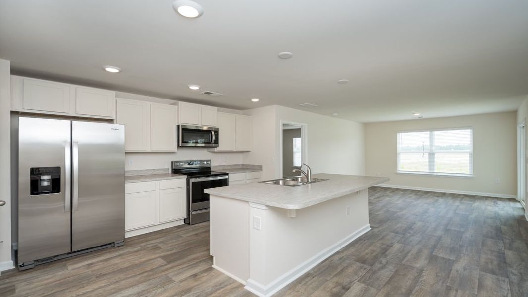 Representative furnished interior of a home built from the ARIA by D.R. Horton in Jordanville Farms, Galivants Ferry (Image 5).