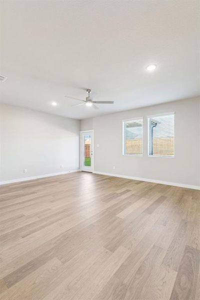 Living Room in the Haylee home plan by Trophy Signature Homes - REPRESENTATIVE PHOTO Living Room in the Haylee home plan by Trophy Signature Homes - REPRESENTATIVE PHOTO