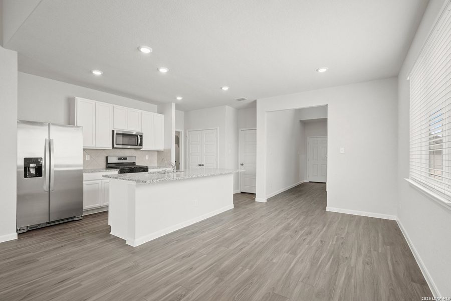 Furnished interior view inside a new home in Hickory Ridge, Elmendorf (Image 7).