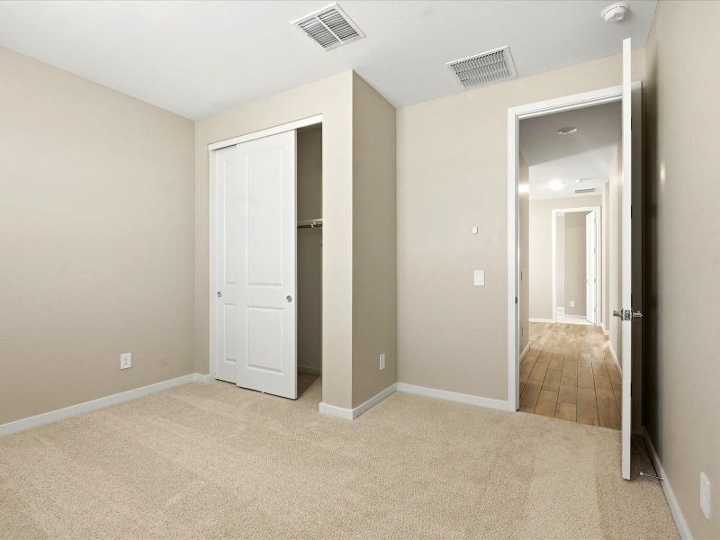 Spacious, unfurnished interior of a new home in White Tank Foothills Reserve Series, Waddell (Image 17).