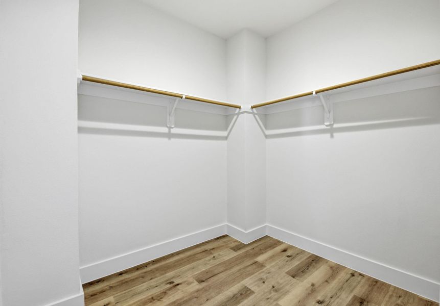 Spacious primary closet Spacious primary closet