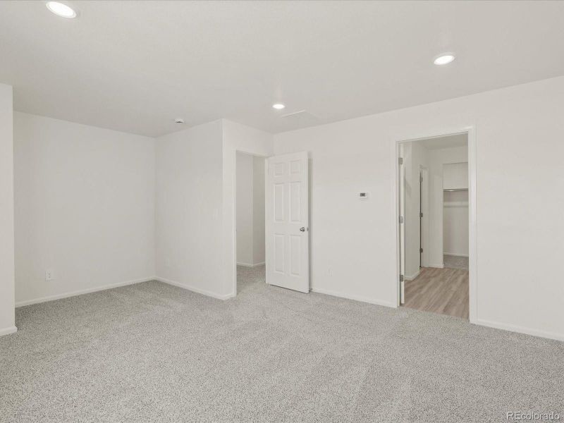 Spacious, unfurnished interior of a new home in Skyview at High Point, Aurora (Image 17).