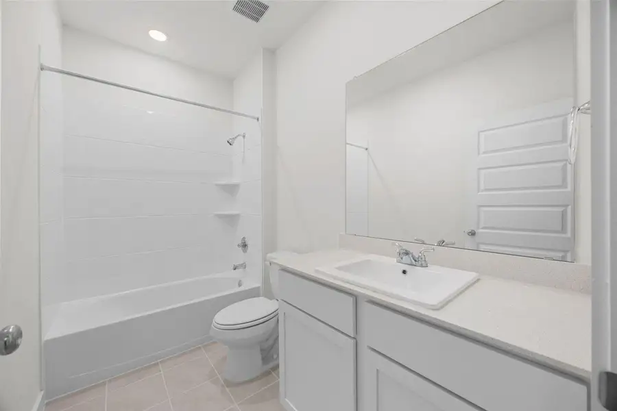 Furnished interior view inside a new home in Prairie Winds, Hutto (Image 12).