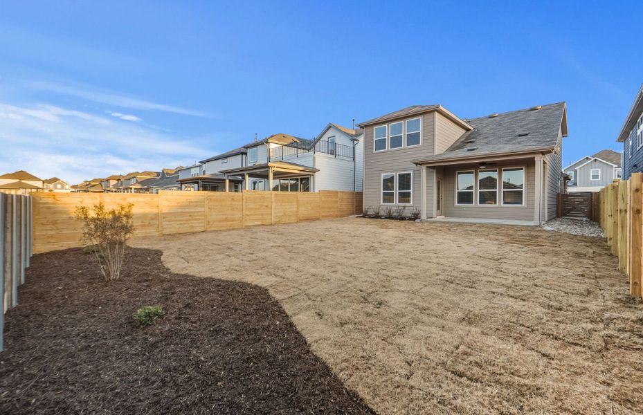 Exterior details and patio area of a home in Horizon Lake, Leander (Image 32).