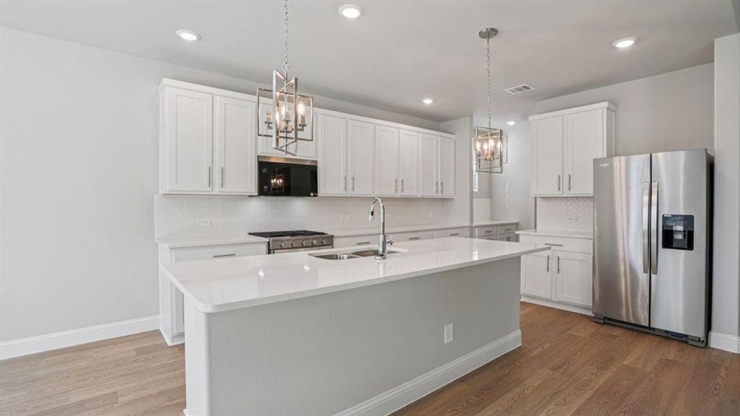 Photo is not of the actual home, but is an inspirational photo of builder’s model home and may depict options, furnishings, and/or decorator features that are not included.