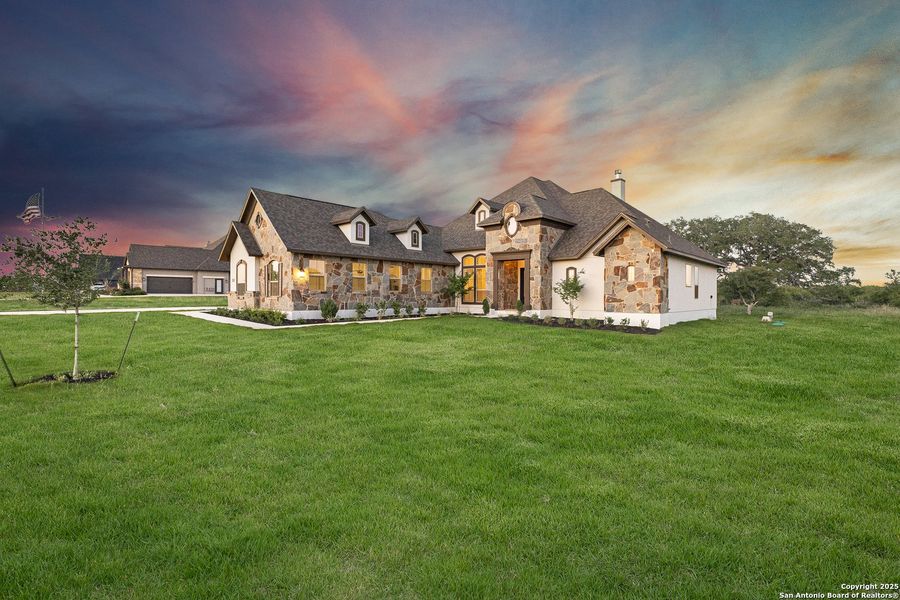 Front exterior of a new home in Potranco Acres, Castroville, TX, highlighting curb appeal (Image 26).