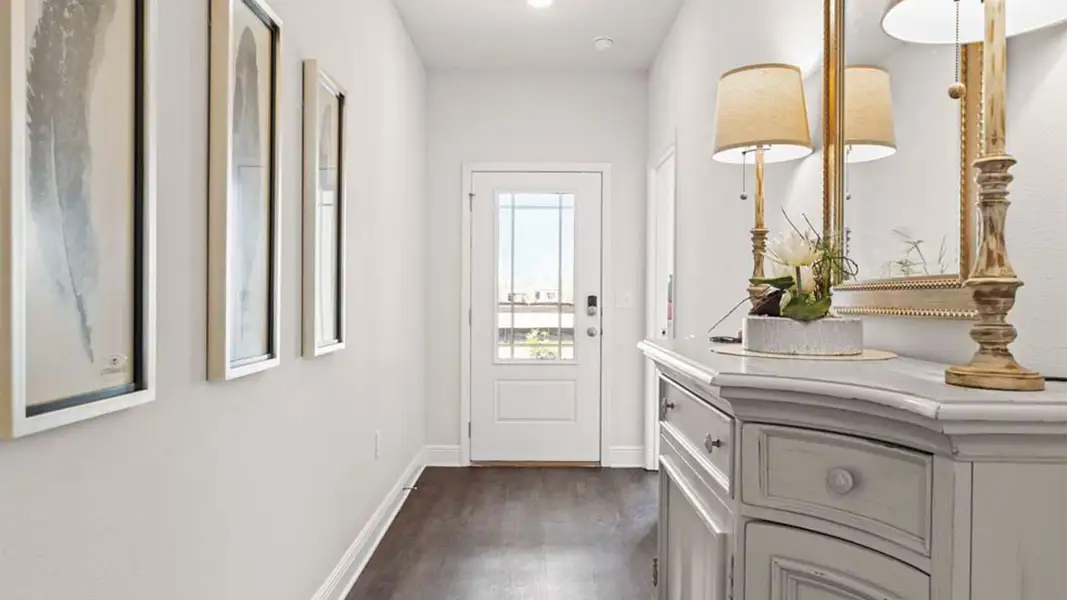 Representative furnished interior of a home built from the The Camden by D.R. Horton in Liberty, Panama City (Image 4).