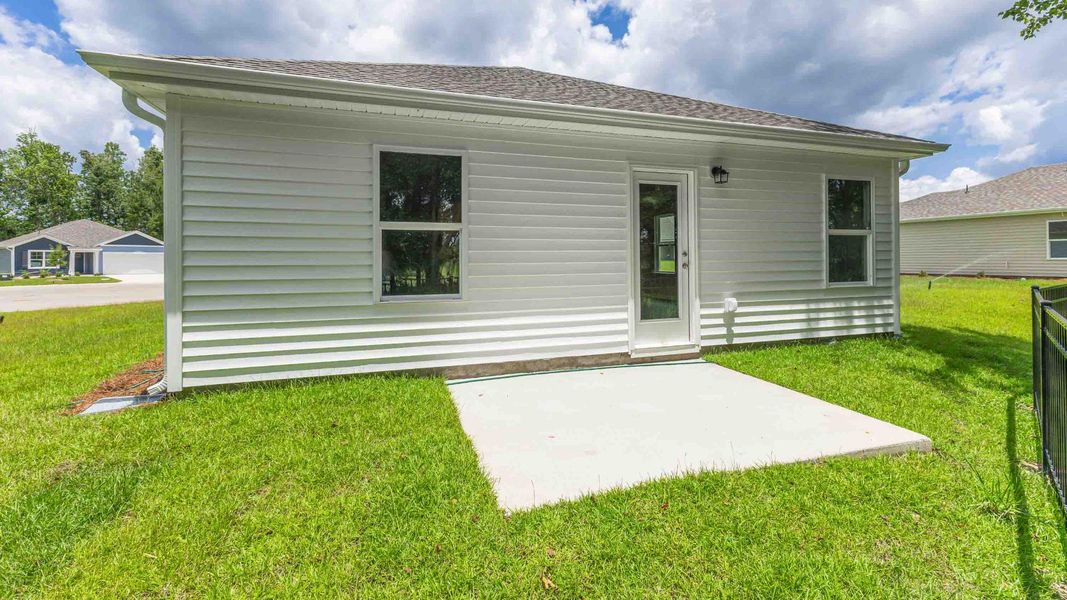 Front exterior of a new home in Eagle Creek, Bolivia, NC, highlighting curb appeal (Image 18).