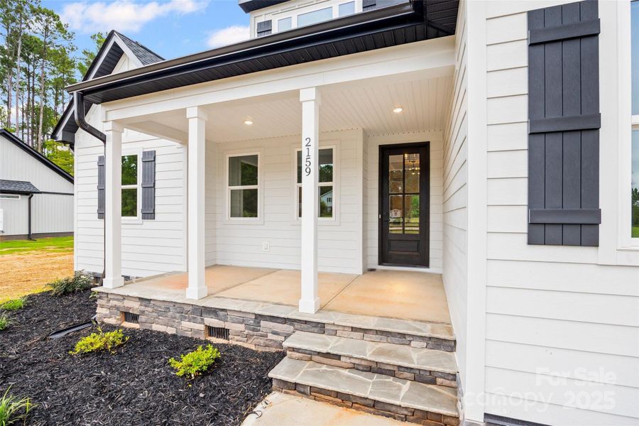 Front exterior of a new home in , Rock Hill, SC, highlighting curb appeal (Image 24).