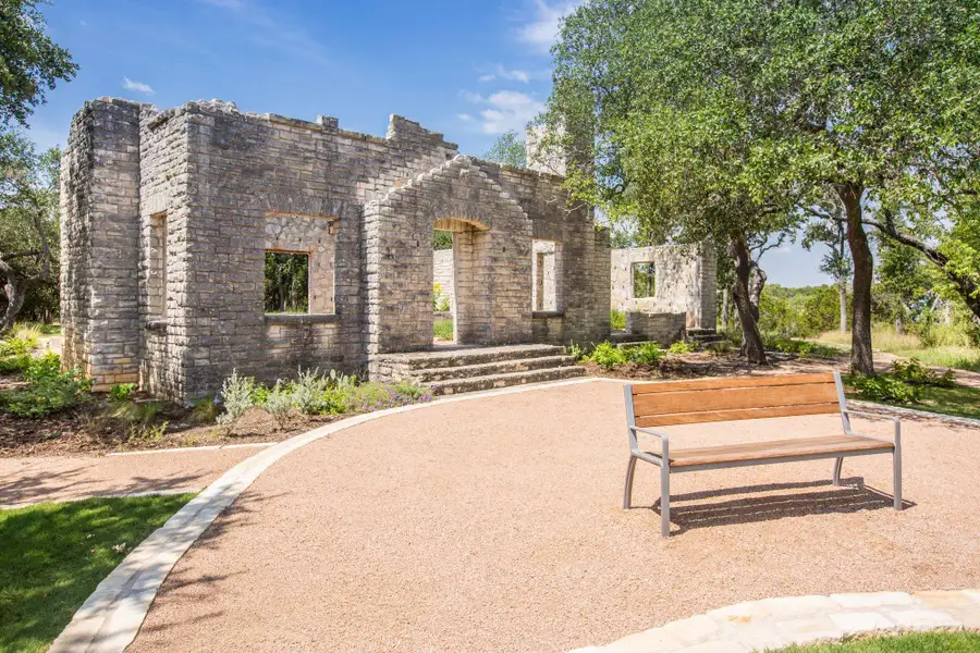 Front exterior of a new home in Headwaters, Dripping Springs, TX, highlighting curb appeal (Image 17).