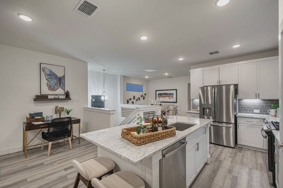 Representative furnished interior of a home built from the Calypso by Chesmar Homes in Prominence Urban, San Antonio (Image 7).