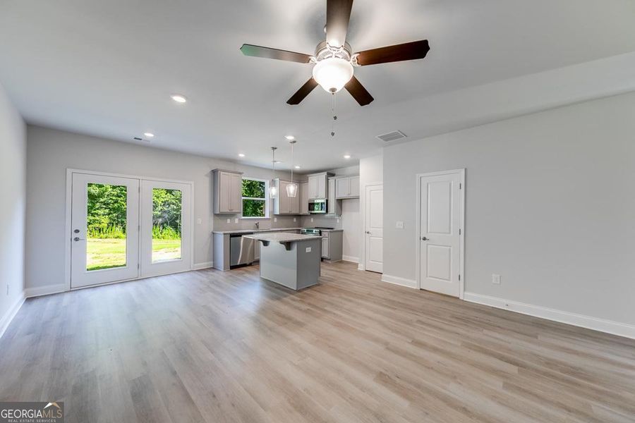 Spacious, unfurnished interior of a new home in Chimney Oaks Townhomes, Homer (Image 13). Spacious, unfurnished interior of a new home in Chimney Oaks Townhomes, Homer (Image 13).