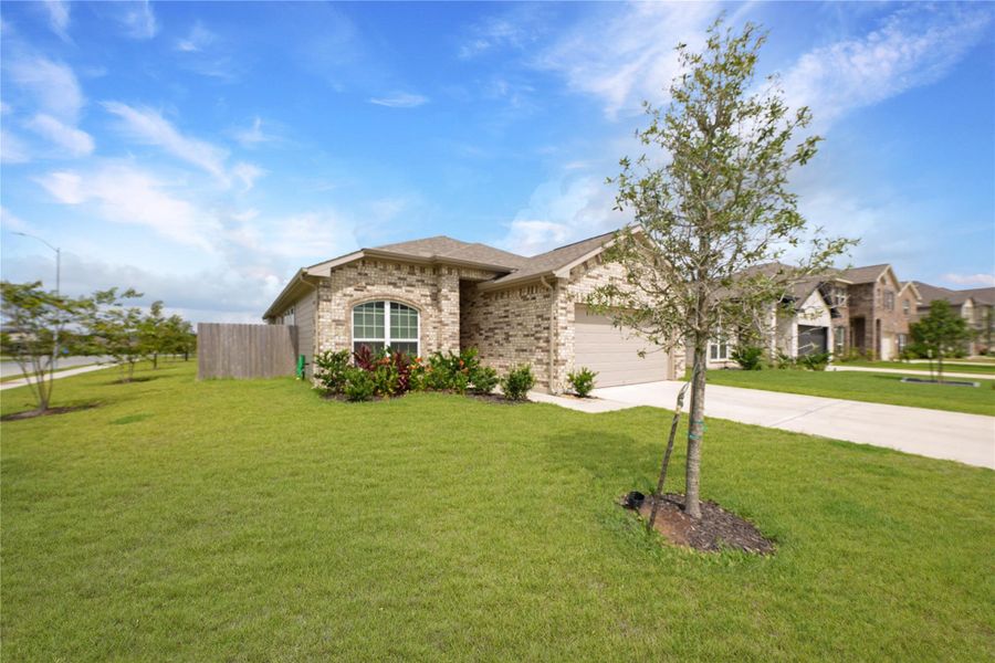 Front exterior of a new home in , La Marque, TX, highlighting curb appeal (Image 22). Front exterior of a new home in , La Marque, TX, highlighting curb appeal (Image 22).