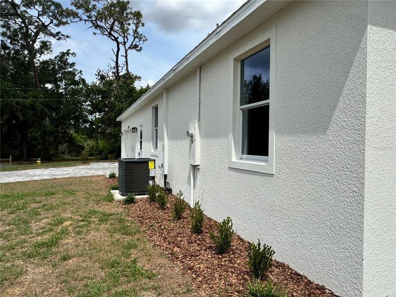 Exterior details and patio area of a home in , Dade City (Image 28).