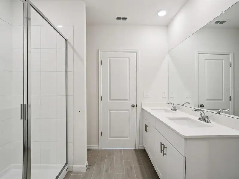 Furnished interior view inside a new home in The Grove at Stuart Crossing - Classic Series, Bartow (Image 5). Furnished interior view inside a new home in The Grove at Stuart Crossing - Classic Series, Bartow (Image 5).